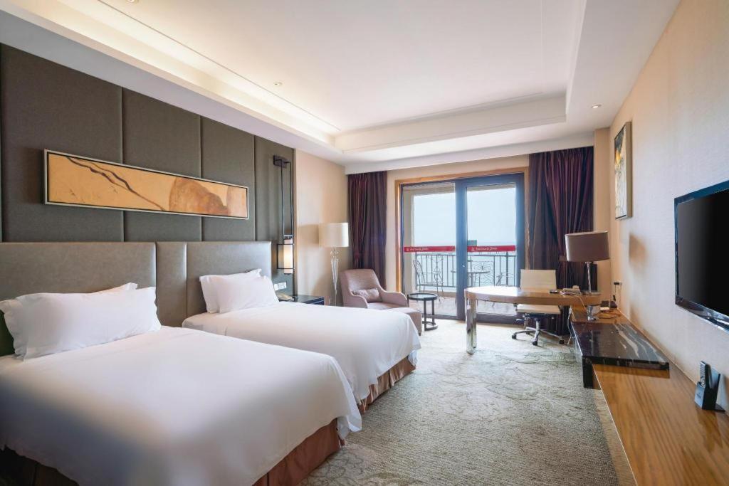 Haiyang Shenglong Jianguo Hotel Fengcheng  Екстер'єр фото